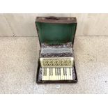 AN ITALIAN PIANO MILANI ACCORDIAN IN CASE