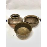 AN EASTERN EMBOSSED COPPER VASE, 26 X 20CMS AND TWO EMBOSSED EASTERN BRASS AND COPPER BOWLS