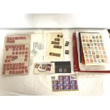 TWO MOSDEN ISRAEL STAMP CATALOGUES AND A QUANTITY OF LOOSE STAMPS