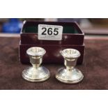 A PAIR OF MINIATURE HALLMARKED SILVER CANDLESTICKS, BIRMINGHAM 2000-MAKER ASPREY'S IN ORIGINAL BOX