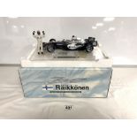A HOT WHEEL'S LTD EDITION FORMULA 1 MCLAREN MERCEDES INCLUDING FROM A PIECE OF AUTHENTIC DRIVING
