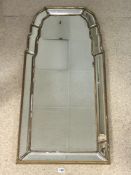A GILT FRAMED RECTANGULAR SHAPED TOP CUSHION MIRROR WITH BEVELLED GLASS, 54 X 112CMS