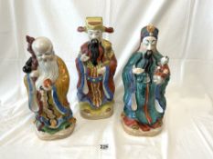 A SET OF THREE 20TH CENTURY CHINESE FENG SHUI GOOD FORTUNE FIGURES, TALLEST 40CMS