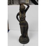 A CERAMIC BISQUE FIGURE OF AN ART DECO EROTIC LADY DANCING, 68CMS