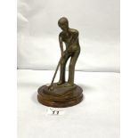 A BRASS FIGURE OF A GOLFER, 20CMS