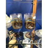 TWO COLOURED GLASS DIMPLE MISSHAPEN WINE GLASSES