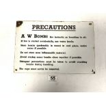 A VINTAGE ENAMEL SIGN 'PRECAUTIONS' A W BOMBS FIRE INSTANTLY ON BREAKING IN AIR, 30 X 20CMS