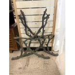 A PAIR OF VICTORIAN TREE FORM IRON BENCH ENDS