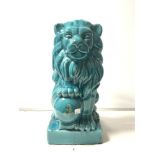 A 20TH CENTURY CHINESE TURQUOISE GLAZED FIGURE OF A MALE LION ON HIND LEGS, 48CMS
