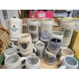 A COLLECTION OF 46 GERMAN STEIN STONEWARE BEER TANKARDS