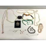 A QUANTITY OF COSTUME JEWELLERY, BEADS AND A MINIATURE PORTRAIT OF A DOG