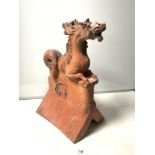 A TERRACOTTA DRAGON DESIGN FRONT OF ROOF RIDGE TILE, 38 X 50CMS