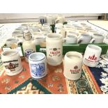 APPROXIMATELY 45 GERMAN STEIN STONEWARE BEER TANKARDS - VARIOUS BRANDS