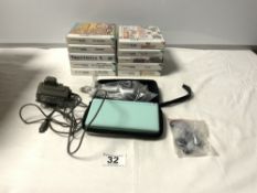 A NINTENDO DS AND TEN GAMES WITH AN ADAPTOR