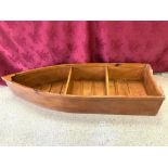 A PINE AND PLY BOAT-SHAPED SET OF SHELVES, 42 X 128CMS