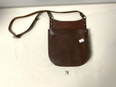 AN ANTIQUE PETER JONES BROWN LEATHER BUS CONDUCTOR BAG