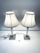 A PAIR OF MODERN CHROME TABLE LAMPS AND SHADES