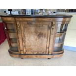 A VICTORIAN GLAZED BOW SIDED WALNUT AND MARQUETRY INLAID CREDENZA WITH ORMOLU MOUNTS AND EBONISED