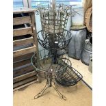 SEVEN VINTAGE WROUGHT IRON PLANTERS AND HAY RACKS