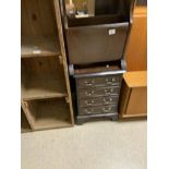 A SMALL REPRODUCTION MAHOGANY FOUR DRAWER CHEST AND A MAGAZINE RACK, 41 X 33 X 60CMS