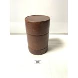 A VINTAGE CYLINDRICAL LEATHER CONTAINER PROBABLY FOR AN ITEM OF SILVER MADE BY BLACK STARR AND FROST