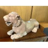 A STONE GARDEN FIGURE OF A LION, 70CMS