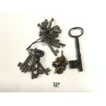 THREE BUNCHES OF OLD KEYS AND A LARGE KEY