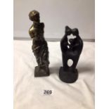 A SPELTER FIGURE OF A GREEK GODDESS 24CMS, AND A PAINTED IRON FIGURE OF A FAMILY GROUP, 20CMS