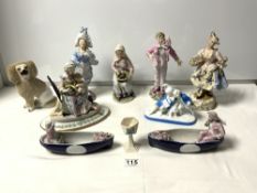 A GROUP OF PORCELAIN AND BISQUE CONTINENTAL FIGURES