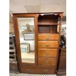 A LATE VICTORIAN RED WALNUT COMPACTUM WARDROBE WITH MIRROR