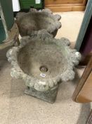 A PAIR OF WEATHERED STONE GARDEN URNS, WITH ACANTHUS LEAF DECORATION ON SQUARE PLINTH BASES, 48 X