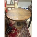 A CIRCULAR OAK PUB TABLE WITH CIDER PRESS SUPPORT COLUMN, 80CMS DIAMETER