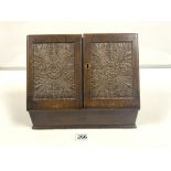A LATE VICTORIAN CARVED MAHOGANY STATIONARY CABINET, 31 X 26CMS