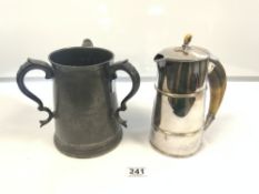 A SILVER-PLATED WATER JUG WITH BOARS TUSK HANDLE AND A PEWTER JUG WITH PRESENTATION INSCRIPTION