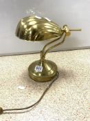 A BRASS ANGLEPOISE DESK LAMP WITH SHELL SHAPE SHADE