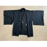 A BLACK KIMONO JACKET