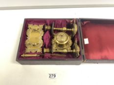 A VICTORIAN ORNATE BRASS DESK SET IN AN ORIGINAL FITTED BOX - CONTAINS PR CANDLESTICKS LETTER