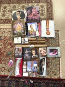 TWO KYLIE MINOGUE DOLLS, CALENDERS, EYE GLASSES, BOOKS, CDS, DVDS ETC