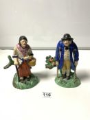 A PAIR OF EARLY 19TH CENTURY STAFFORDSHIRE POTTERY FIGURES OF AN OLD MAN AND WOMAN, 21 CMS