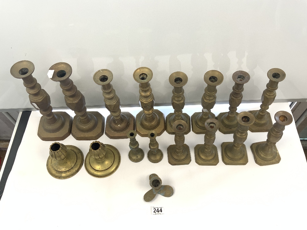 SEVEN PAIRS OF VICTORIAN DIAMOND PATTERN GRADUATING BRASS CANDLESTICKS, THE TALLEST 32CMS, AND - Image 2 of 4