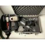A TAMASHI CAMERA AND EQUIPMENT IN A FITTED CASE, AND A CANON VIDEO CAMERA IN CASE