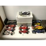 A QUANTITY OF MINICHAMPS AND HOT WHEELS MODEL FORMULA 1 CARS AND A BOXED MARK WEBBER HOT WHEELS