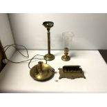 AN ORNATE BRASS DESK STAMP BOX, A BRASS LAMP WITH GLASS FUNNELL, A BRASS CORINTHIAN COLUMN LAMP, AND