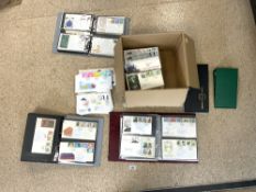 A LARGE QUANTITY OF FIRST DAY COVERS IN ALBUMS AND LOOSE