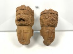 A PAIR OF THAILAND CARVED WOODEN BUDDHA HEADS, 30CMS