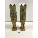 A PAIR OF BRASS TRENCH ART SHELLS WITH IVY LEAF DECORATION, 34.5CMS