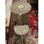 A CARVED MOORISH FOLDING TABLE AND A MILKING STOOL ON BOBBIN LEGS