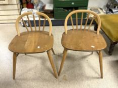A PAIR OF LIGHT COLOUR ERCOL STICK BACK 1000 CHAIRS