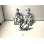 A PAIR OF REPRODUCTION CHINESE BLUE & WHITE FIGURES - SEATED AND FIGURE OF A RICKSHAW, THE TALLEST