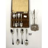 EIGHT MIXED GEORGIAN SILVER TEASPOONS, 108 GRAMS WITH A PAIR OF WHITE METAL SERVING TONGS